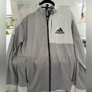 Brand new men’s Adidas lightweight jacket.